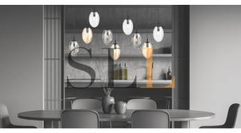 Suspensions multiples au-dessus d’une table : nos astuces déco tendance 2025